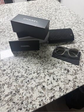 CHANEL Clear Frame Sunglasses with Black Quilted Case